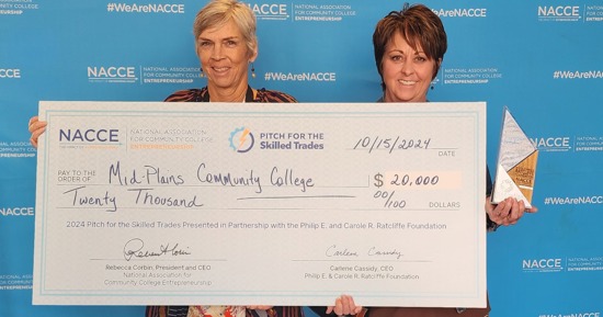 MPCC Ogallala Campus Administrator Mary Pierce (left) and MPCC Dean of Outreach Gail Knott are pictured with a check for $20,000 awarded to the college from the Ratcliffe Foundation after a successful pitch about the MPCC Ready-to-Work: Building Construction Homes for Heroes program during the National Association for Community College Entrepreneurship Innovation in the Heartland Annual Conference.